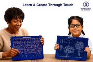 A woman uses the Braille Side of BrailleDoodle beside a girl holding the Doodle Side with a raised-dot heart. Text reads: Learn & Create Through Touch. No batteries. No screens.